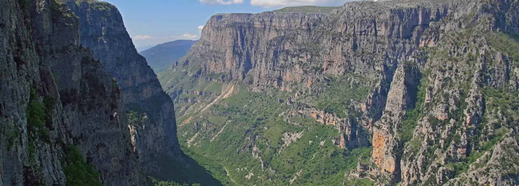 Sheer limestone walls of Vikos Gorge in the Zagori mountains