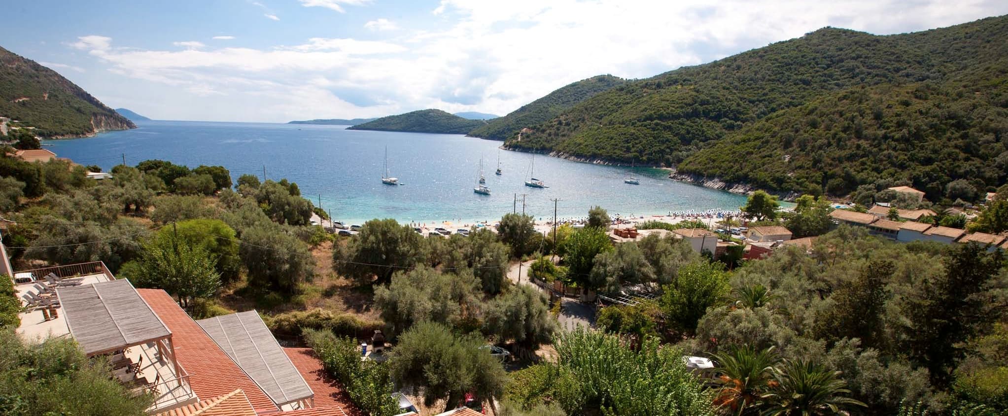 Campervan crossing onto Lefkada with turquoise water on both sides
