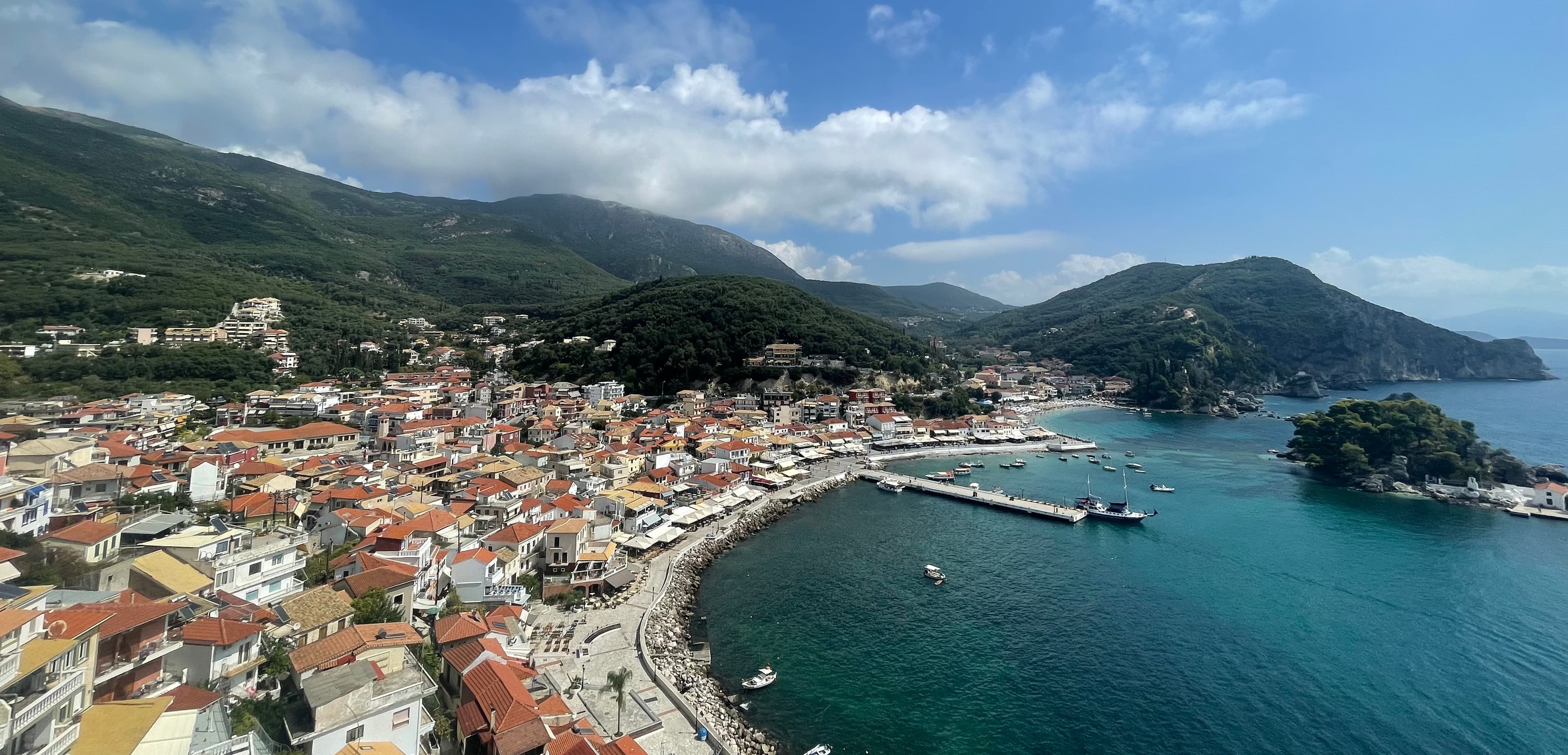 Parga harbour with colourful houses and Venetian citadel